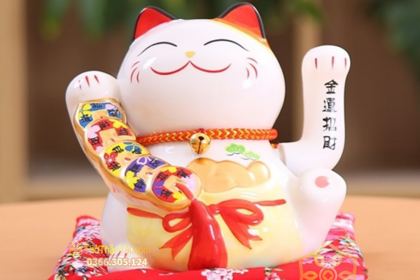 Ảnh Mèo Thần Tài giơ tay trái